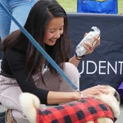 Student at Dogs with the Deans event